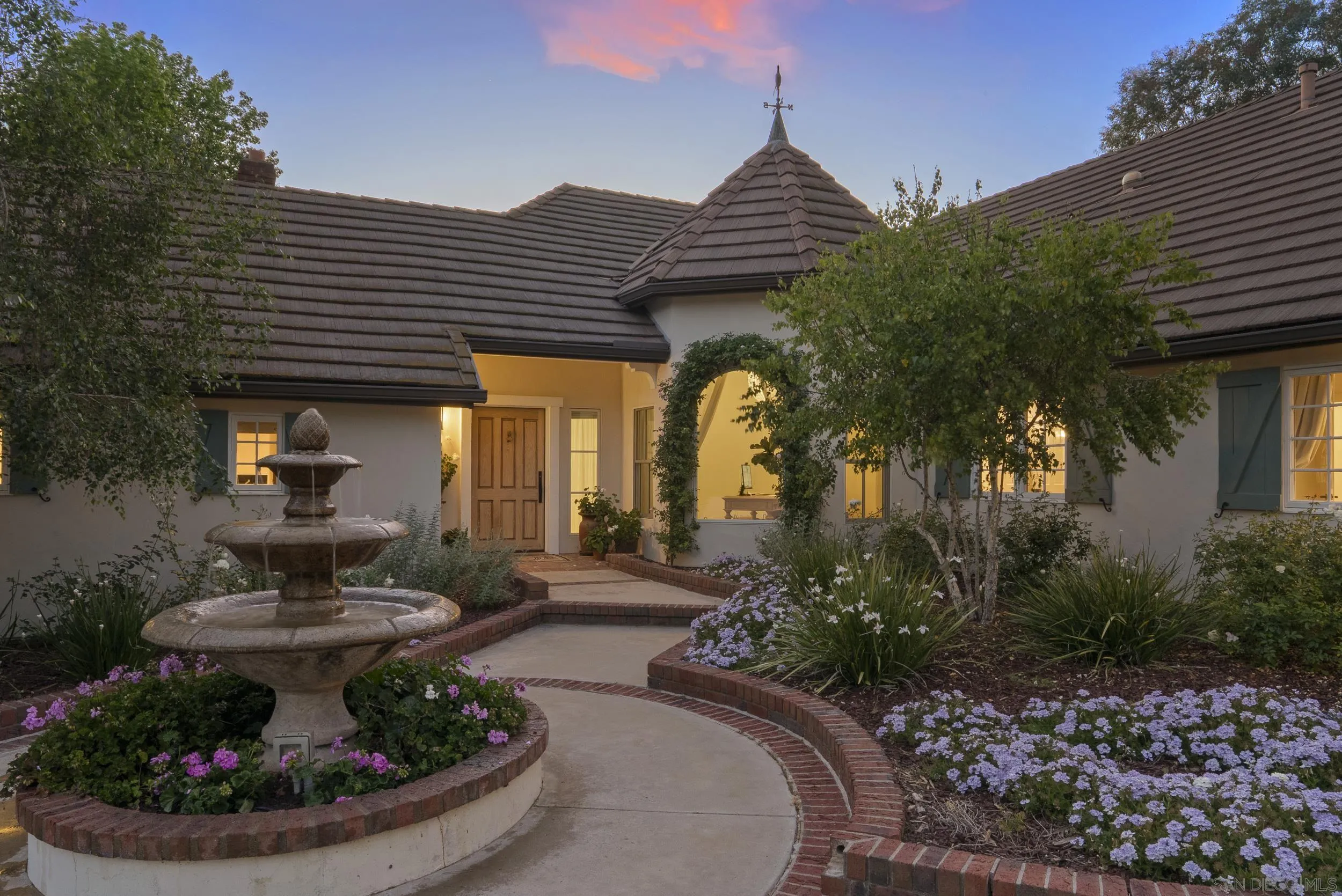 5 Country Glen Road Fallbrook, CA 92028 - Photo 2 of 43 a view of a house with fountain in a patio