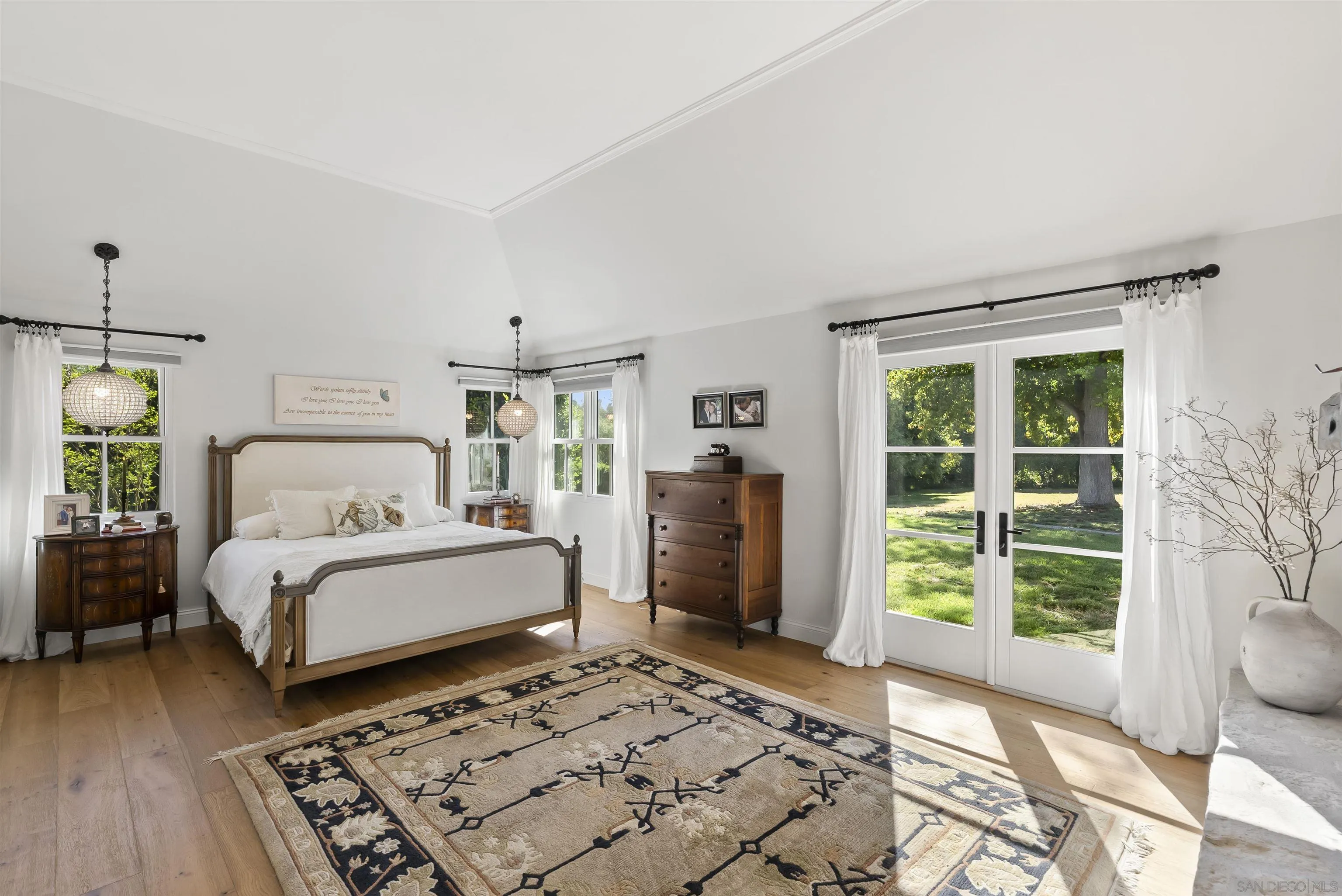5 Country Glen Road Fallbrook, CA 92028 - Photo 23 of 43 a bedroom with a large bed and a window