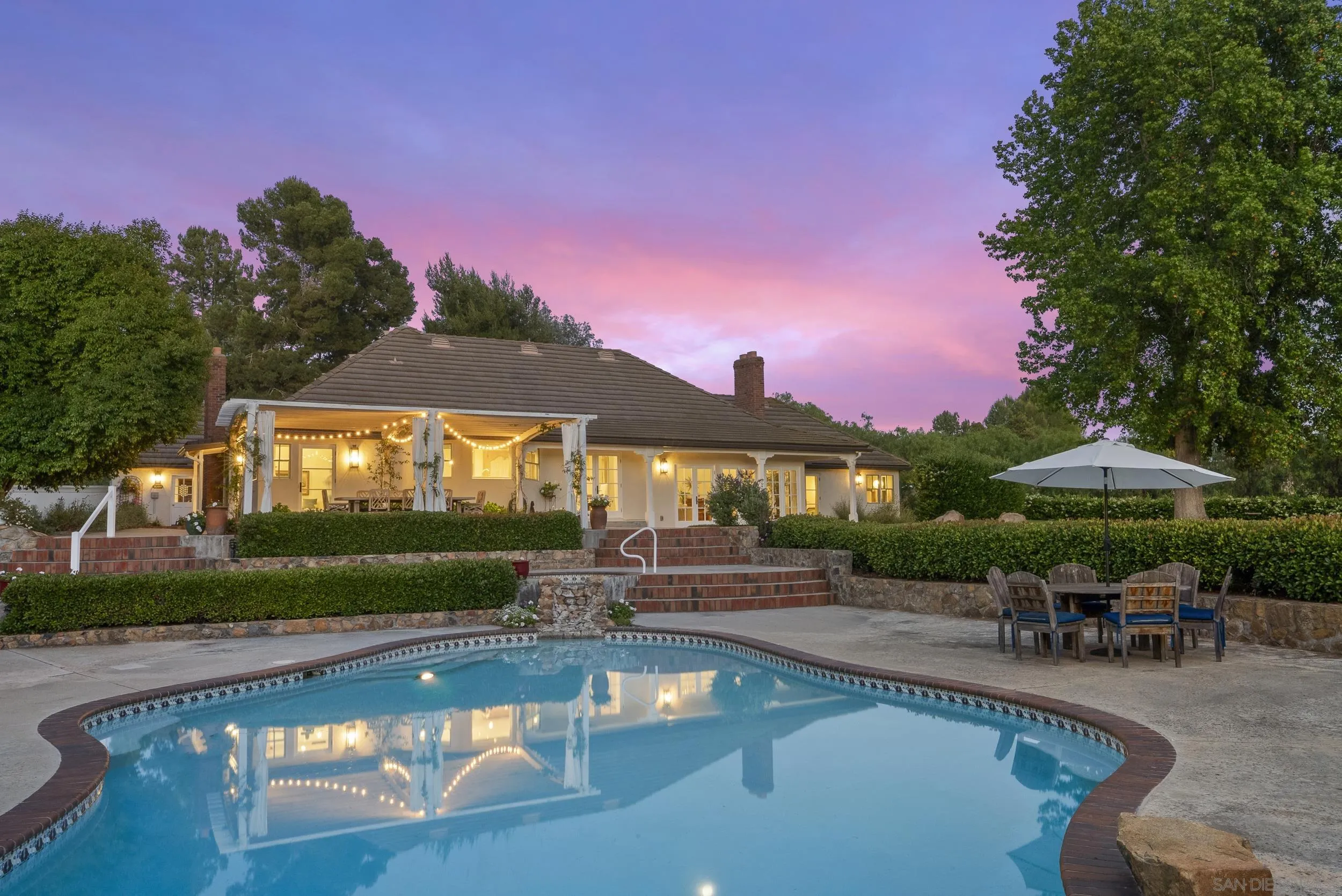 5 Country Glen Road Fallbrook, CA 92028 - Photo 33 of 43 a view of a swimming pool with a patio and a yard