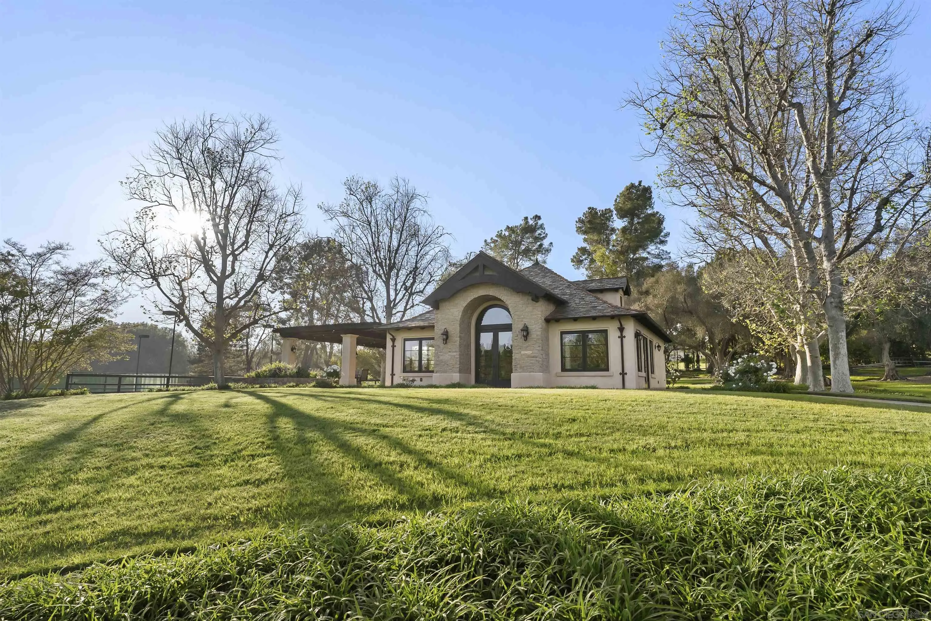 5 Country Glen Road Fallbrook, CA 92028 - Photo 42 of 43 a white house with a big yard and large trees