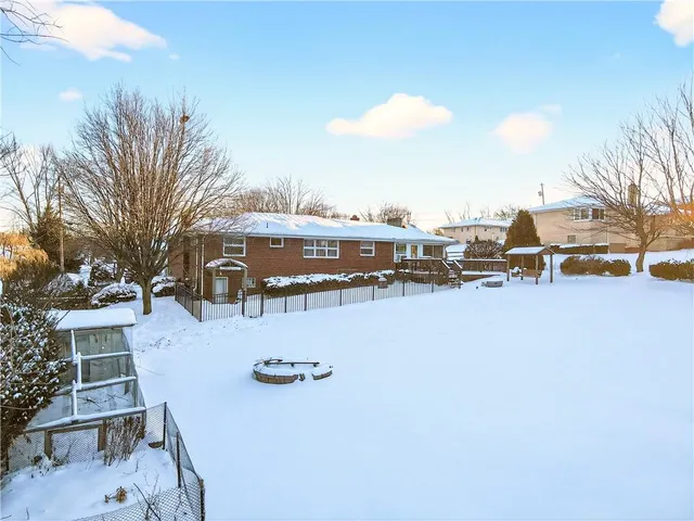 a view of a roof deck with couches