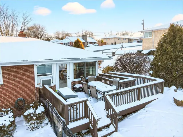 a view of car parked beside of a road