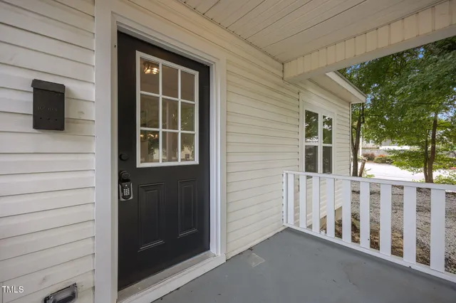 a view of front door and porch