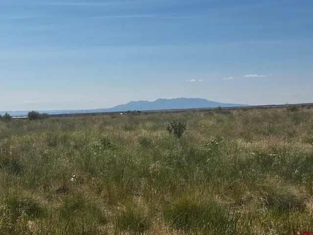 a view of lake with mountain