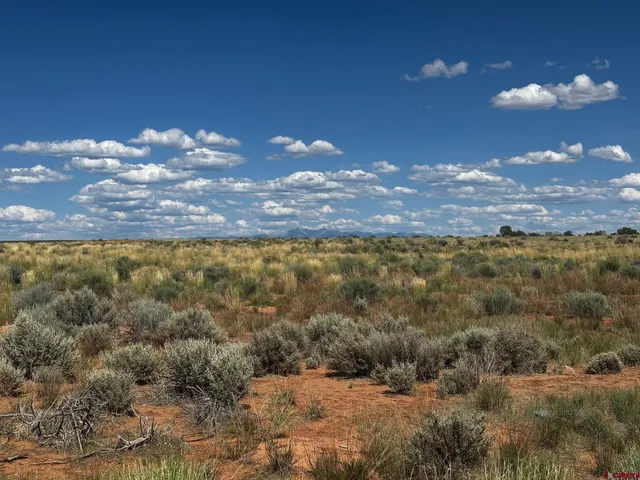 a view of a houses with sky view