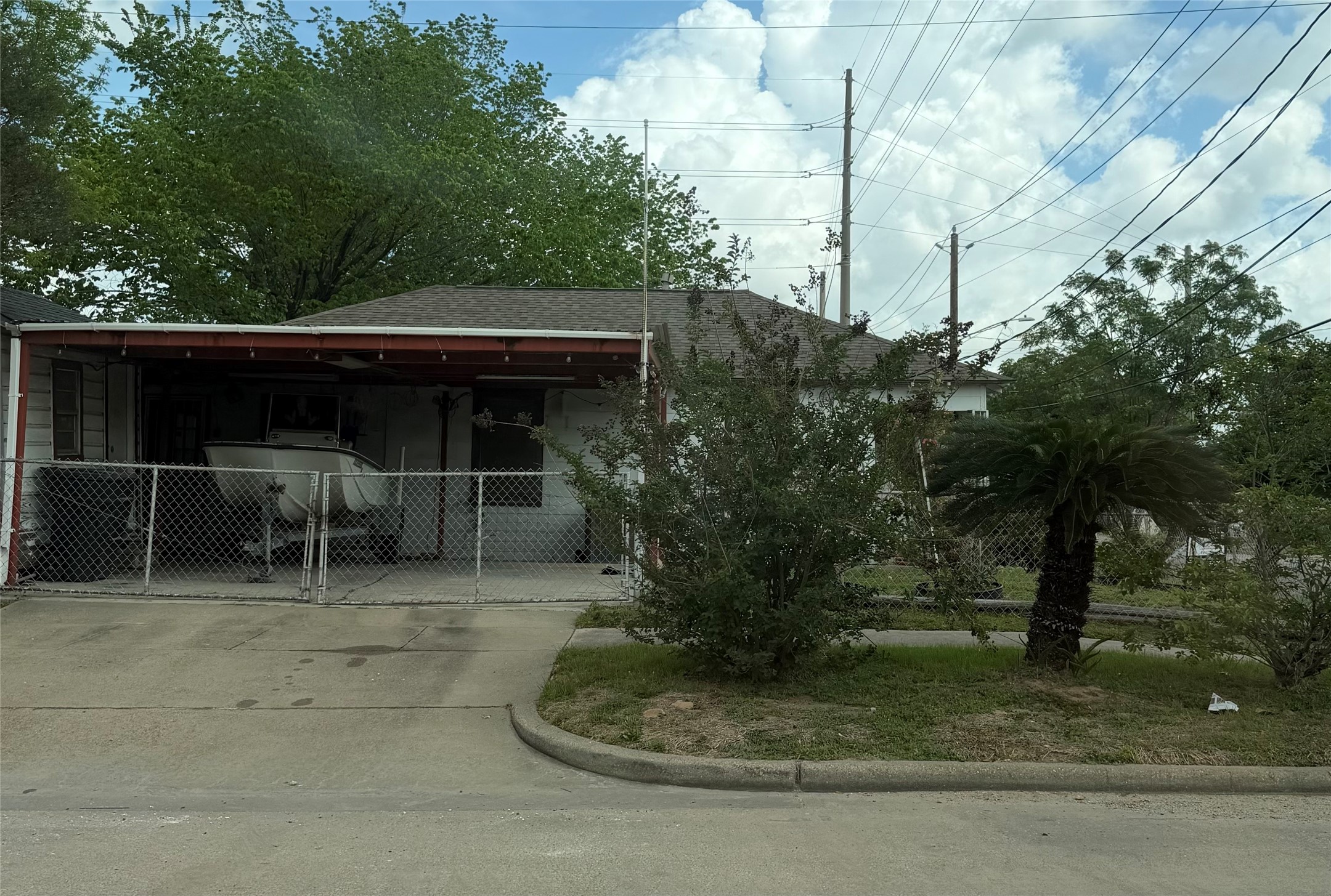 703 76th Street Houston, TX 77012 - Photo 4 of 23 a front view of a house with garden