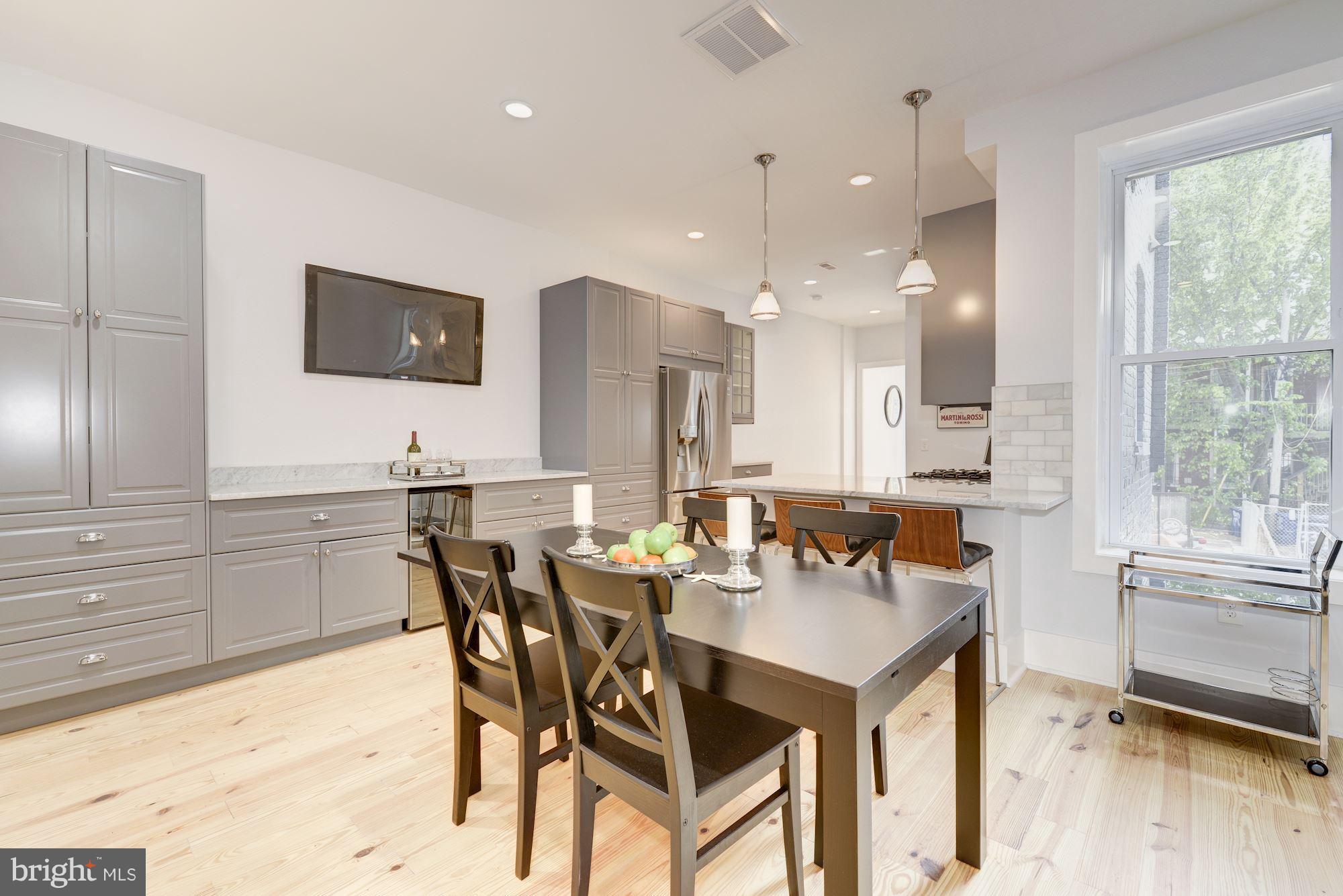 35 U Street Northeast Washington, DC 20002 - Photo 5 of 29 Dining room can easily seat 10 at the table