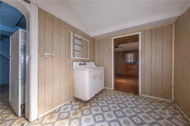 a view of a hallway with windows