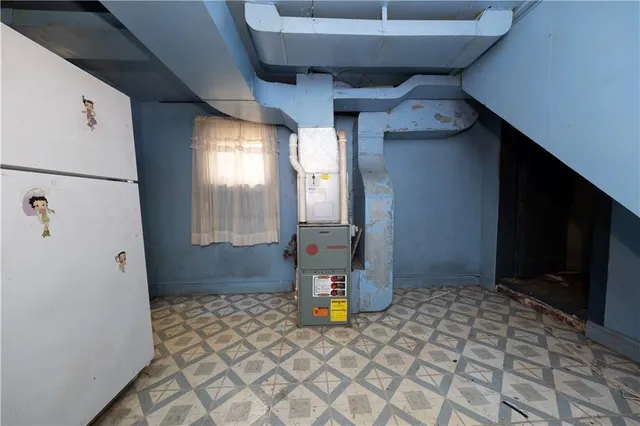 a spacious bathroom with a sink a mirror and a shower