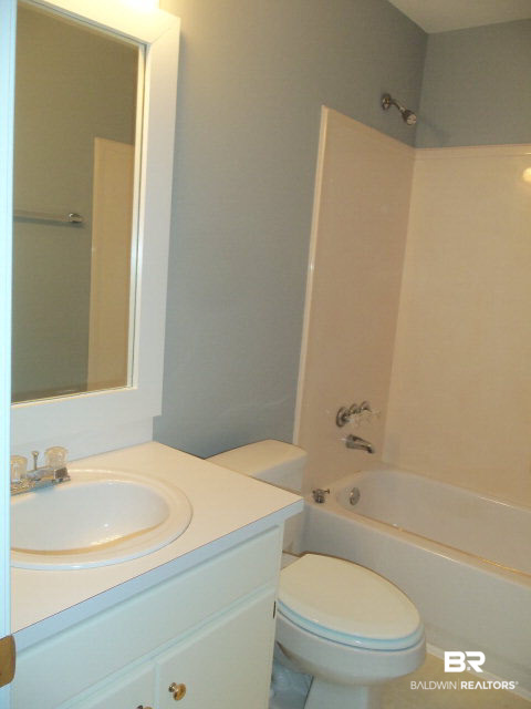 18568 South Greeno Road Fairhope, AL 36532 - Photo 10 of 22 CULTURED MARBLE SURROUND ON TUB SHOWER COMBO.