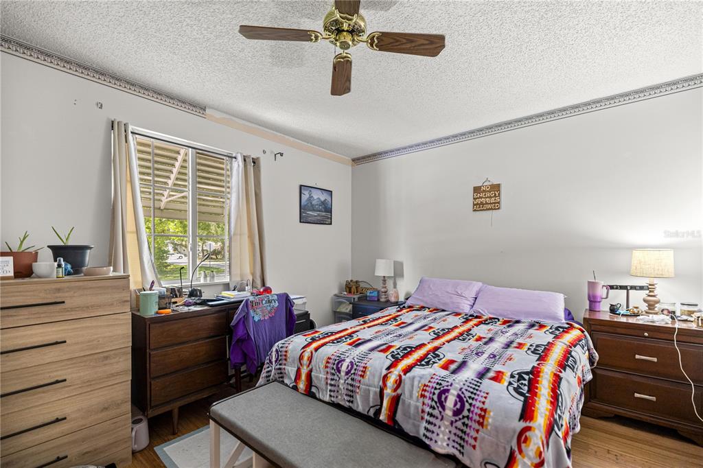 9021 Southwest 108th Place Ocala, FL 34481 - Photo 19 of 30 a bedroom with a bed and a closet