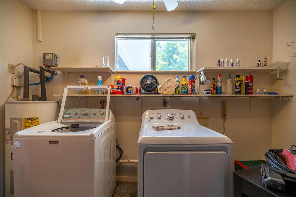 9021 Southwest 108th Place Ocala, FL 34481 - Photo 24 of 30 a utility room with dryer and washer