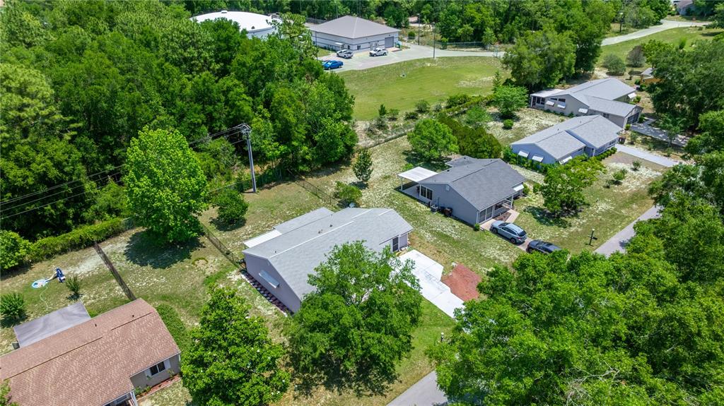 9021 Southwest 108th Place Ocala, FL 34481 - Photo 27 of 30 an aerial view of a house with a garden