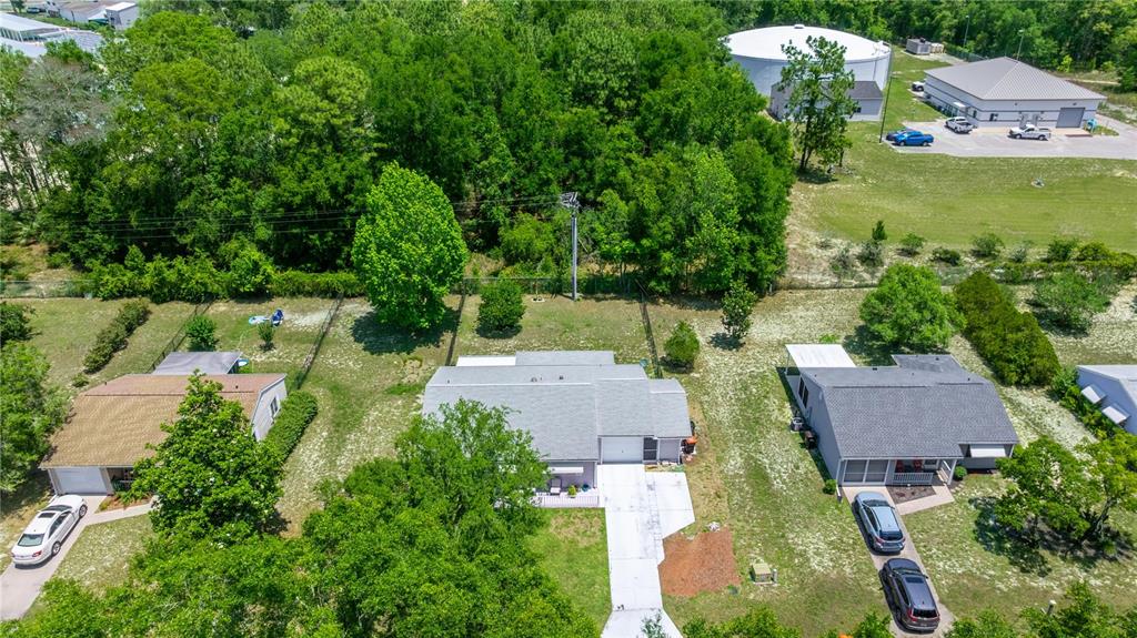 9021 Southwest 108th Place Ocala, FL 34481 - Photo 28 of 30 an aerial view of a house with outdoor space and street view