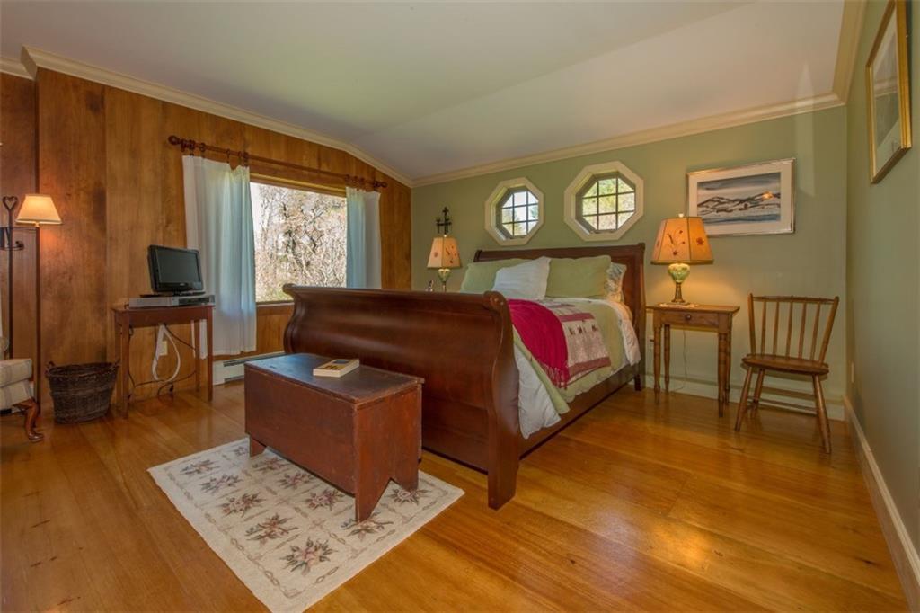 49 Meadow Cove Road Boothbay, ME 04544 - Photo 19 of 35 The first floor master bedroom with...