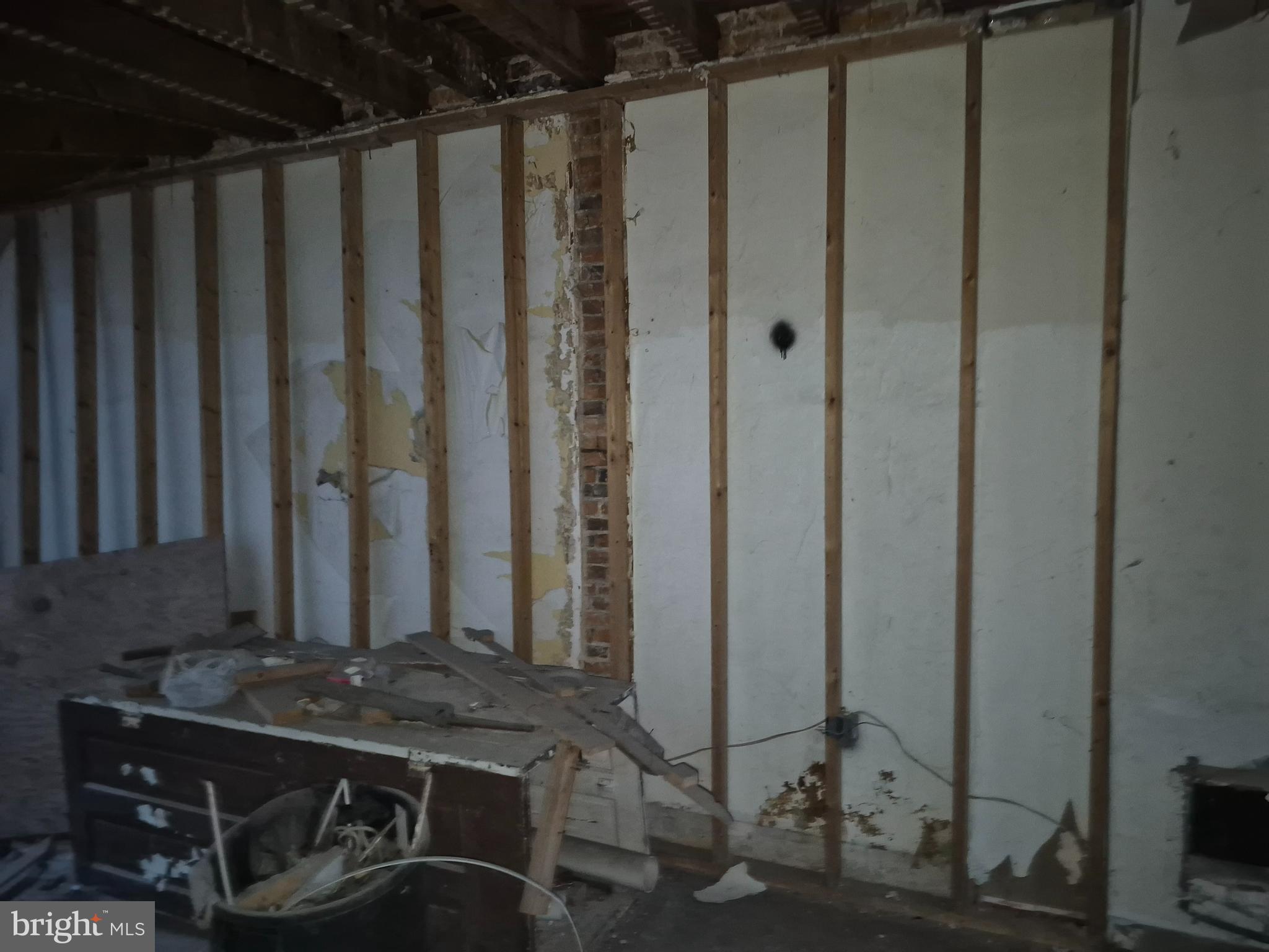 5 Wheeler Avenue Baltimore, MD 21223 - Photo 4 of 7 a bathroom with a granite countertop sink and a mirror