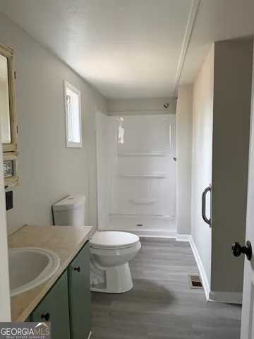 a bathroom with a sink and a toilet