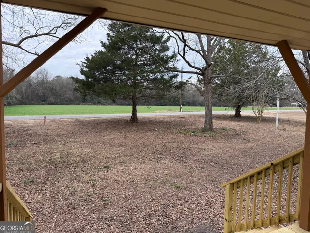 a view of a yard with a sink