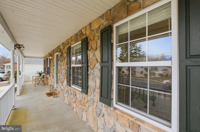 a living room with furniture or couch and a window
