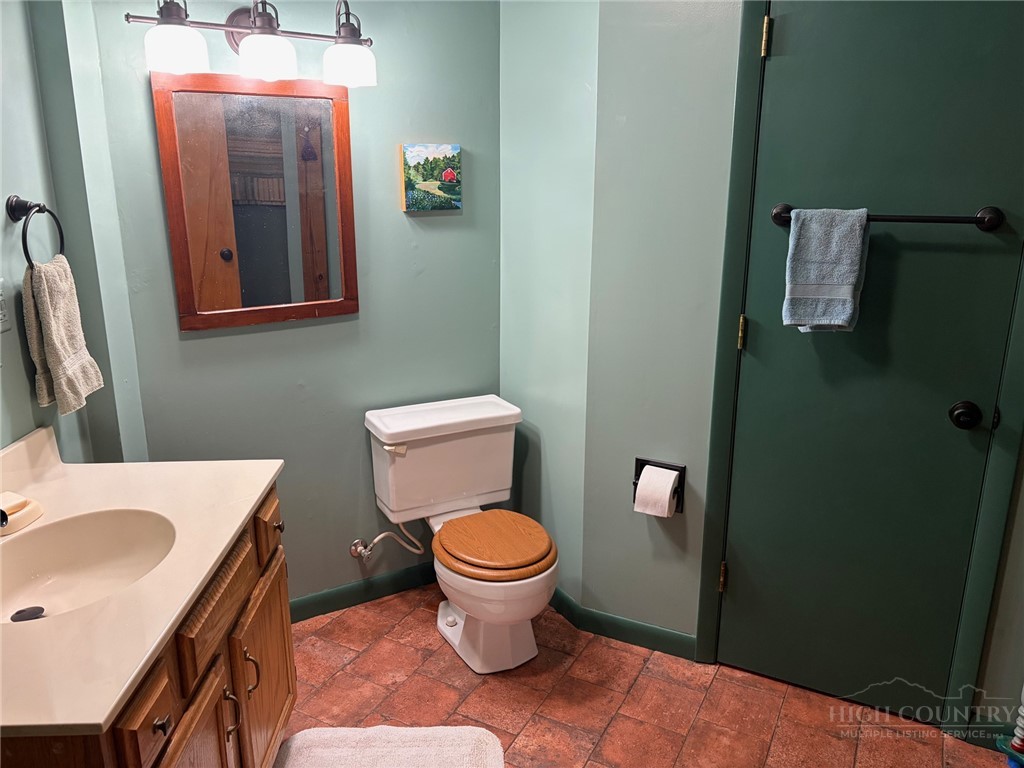 873 Silverleaf Road Zionville, NC 28698 - Photo 34 of 49 a bathroom with a toilet and a sink
