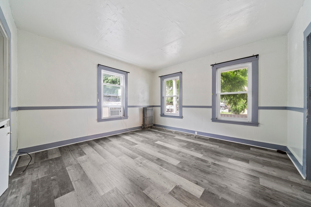 20 Rodney Street Worcester, MA 01605 - Photo 12 of 35 a view of an empty room with a window