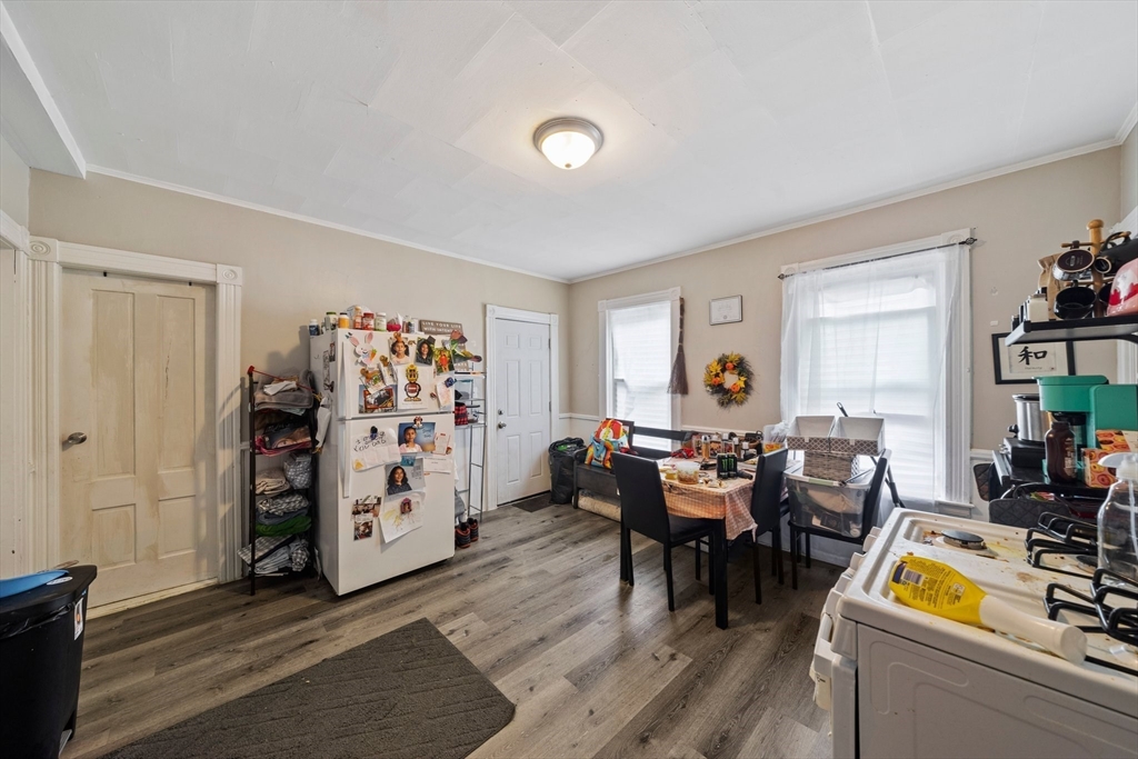 20 Rodney Street Worcester, MA 01605 - Photo 21 of 35 a dining room with furniture and wooden floor