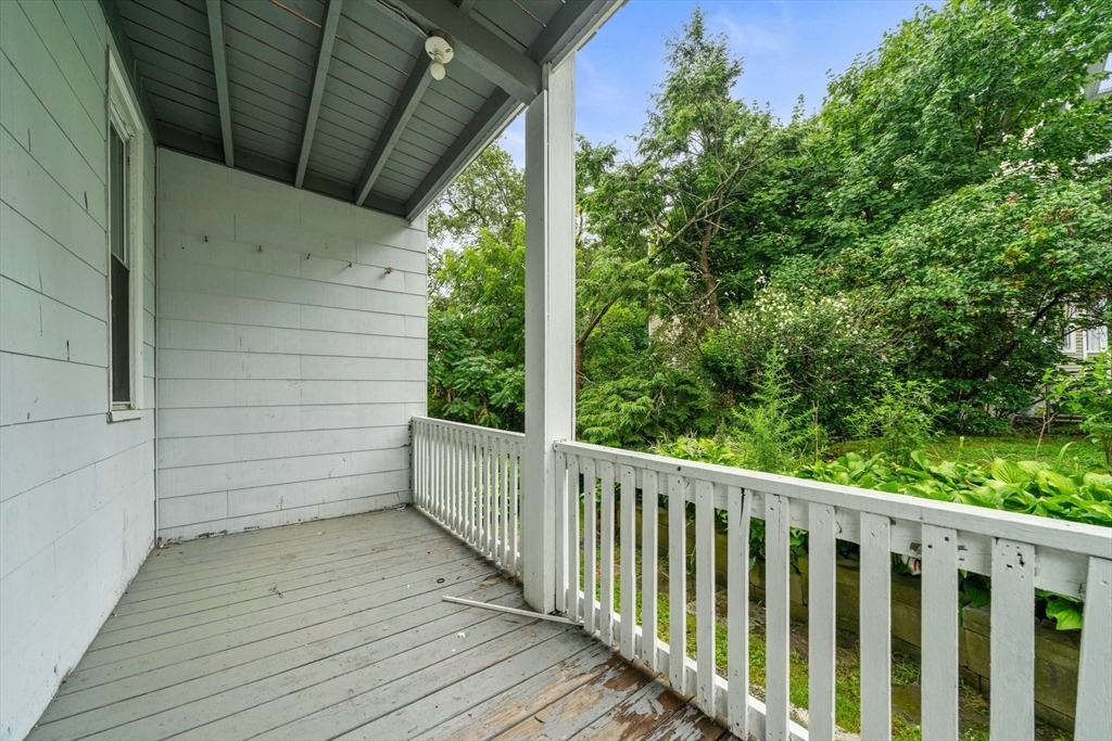 20 Rodney Street Worcester, MA 01605 - Photo 33 of 35 a view of a balcony with wooden floor