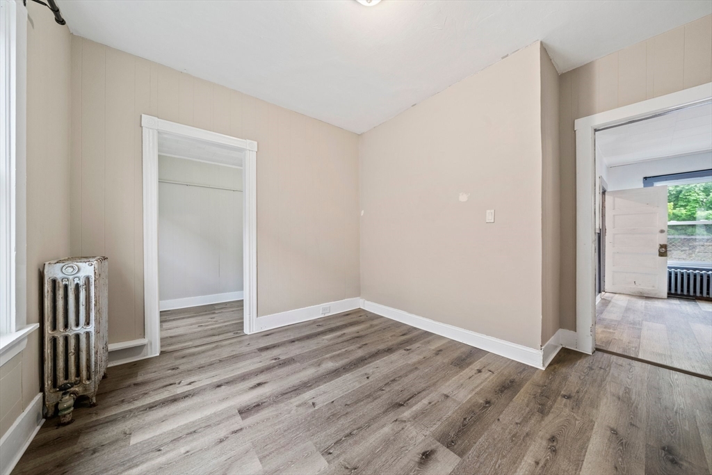 20 Rodney Street Worcester, MA 01605 - Photo 10 of 35 wooden floor in an empty room