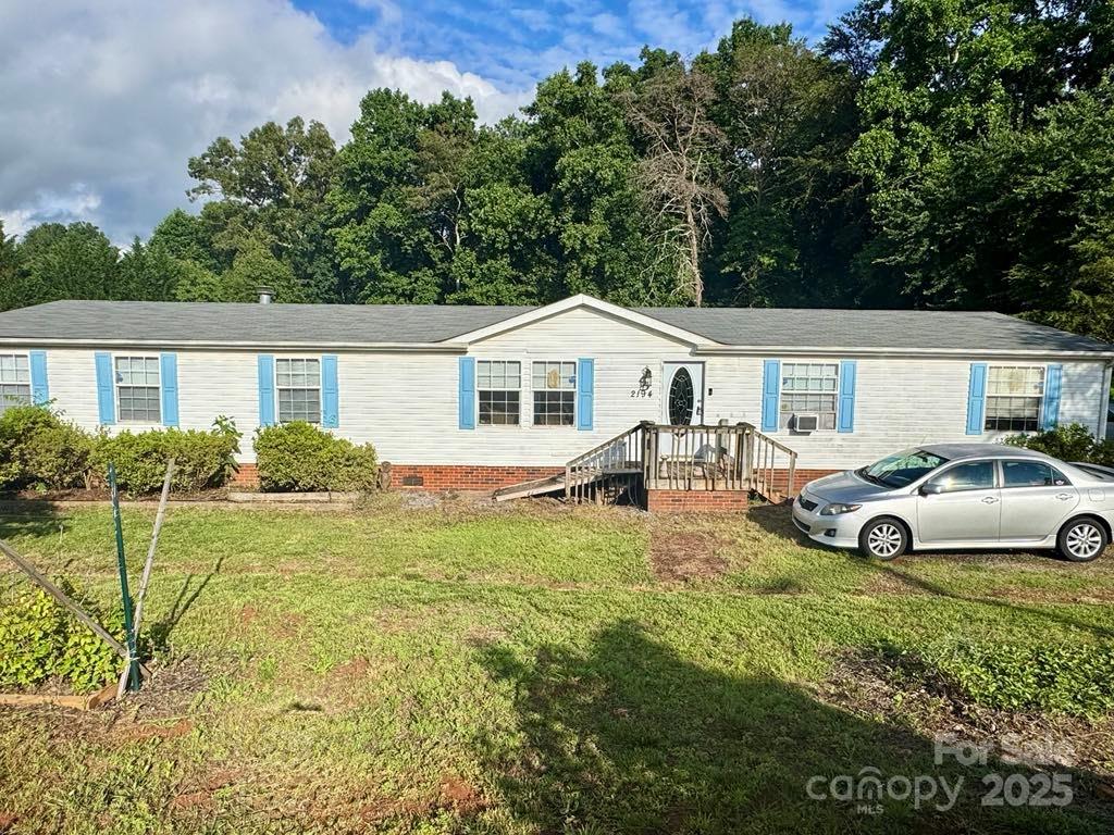 2194 Sterling Ridge Drive Newton, NC 28658 - Photo 1 of 26 a view of a house with backyard and sitting area