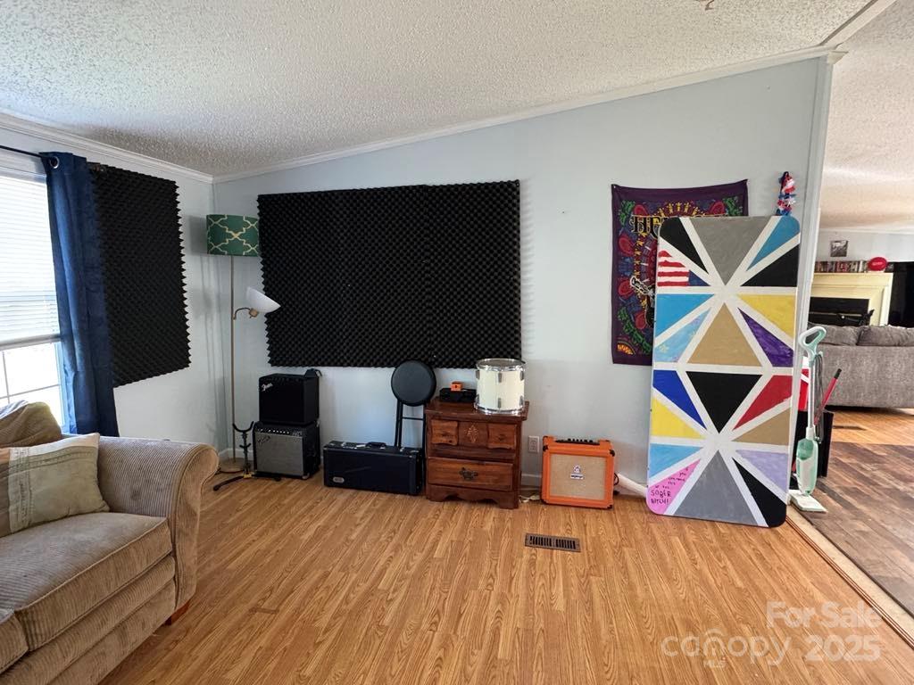 2194 Sterling Ridge Drive Newton, NC 28658 - Photo 11 of 26 a living room with furniture and a flat screen tv