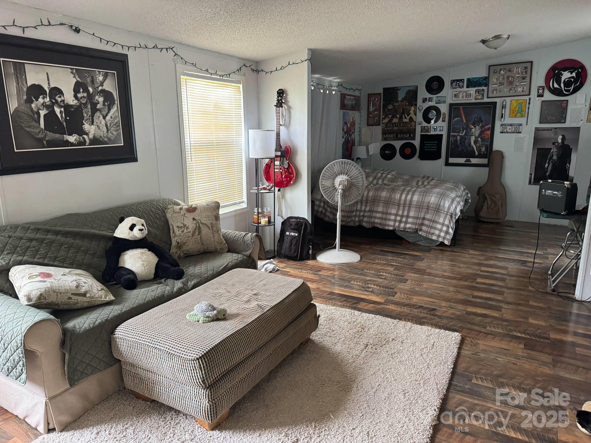 2194 Sterling Ridge Drive Newton, NC 28658 - Photo 18 of 26 a living room with furniture and a window