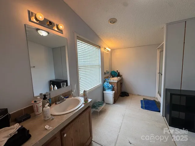 a bathroom with a sink and a toilet