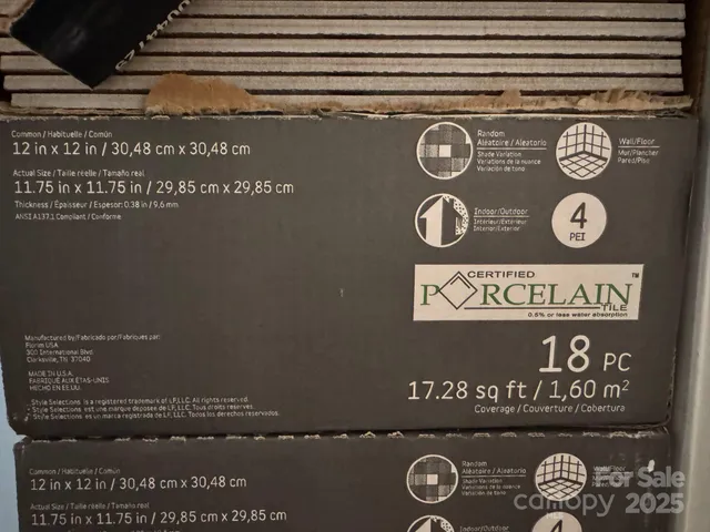 a bedroom with a bed window and a flat screen tv