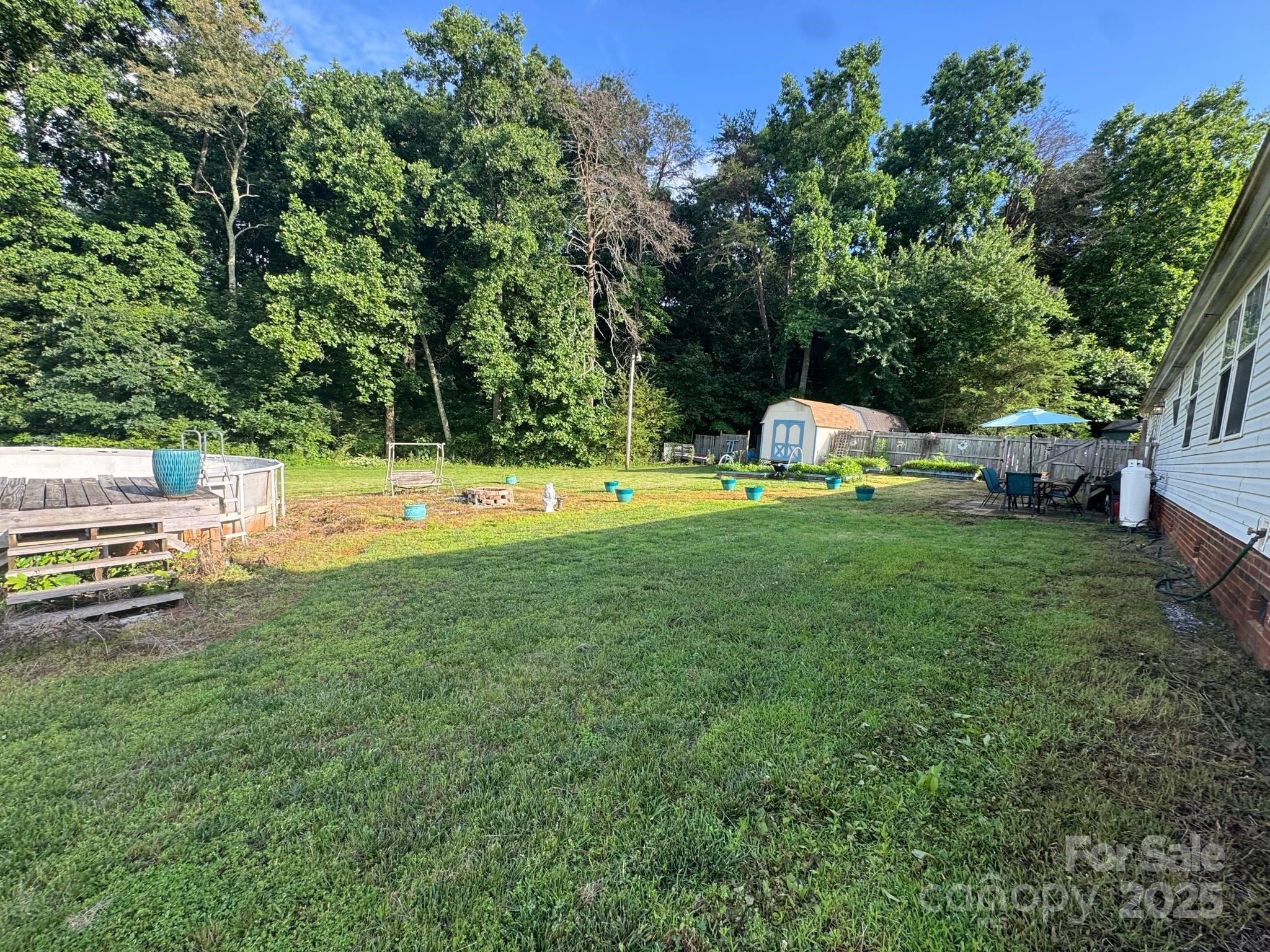 2194 Sterling Ridge Drive Newton, NC 28658 - Photo 7 of 26 a view of a swimming pool with a yard