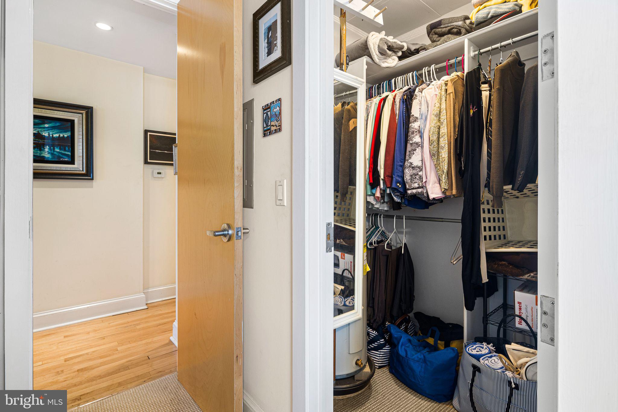 214 New Street, Unit C Philadelphia, PA 19106 - Photo 17 of 29 a view of walk in closet with clothes and shoes