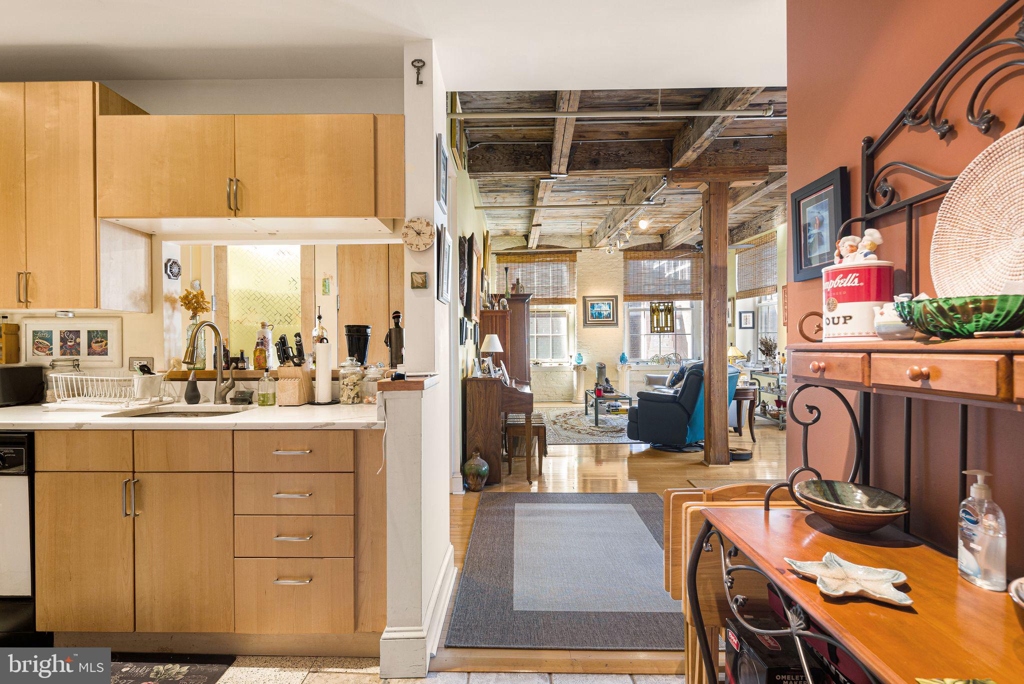 214 New Street, Unit C Philadelphia, PA 19106 - Photo 20 of 29 a room with lots of wooden furniture and a table