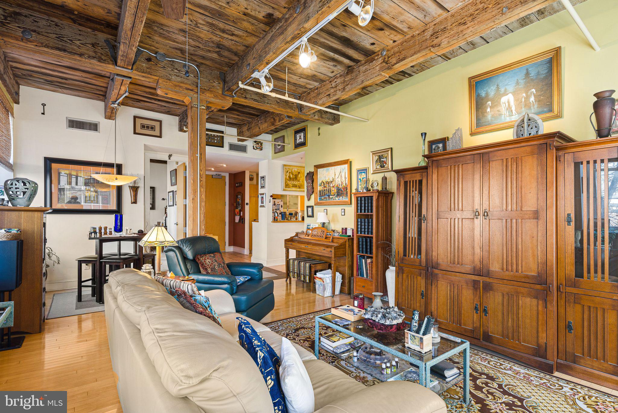 214 New Street, Unit C Philadelphia, PA 19106 - Photo 4 of 29 a living room with furniture