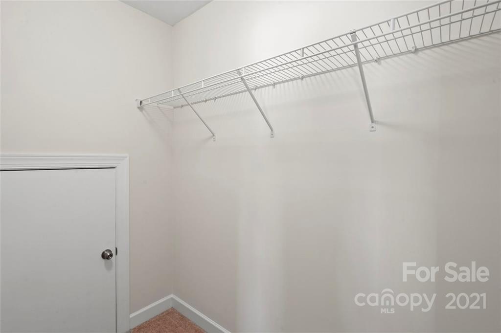 4331 Oxford Mill Road Waxhaw, NC 28173 - Photo 36 of 48 a view of a room with racks on the wall