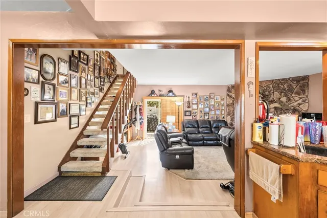 a view of a living room with a large window