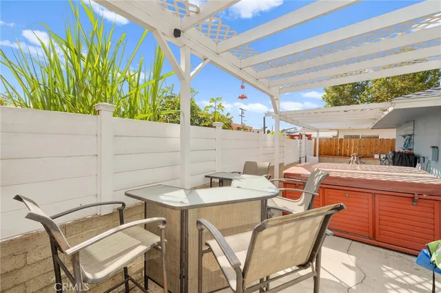 a table and chairs in front of a building