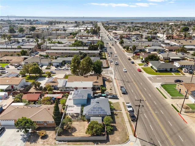 an aerial view of residential building and parking space