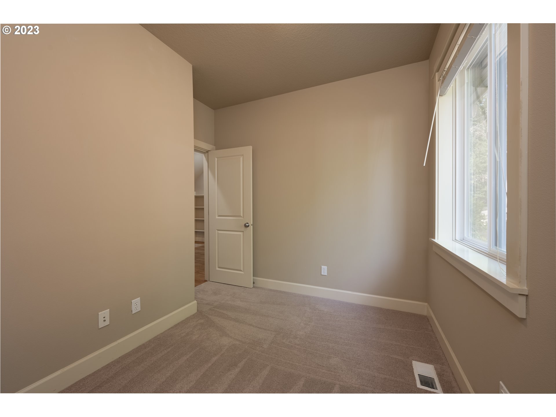 2213 St Moritz Loop West Linn, OR 97068 - Photo 13 of 48 a view of an empty room and window