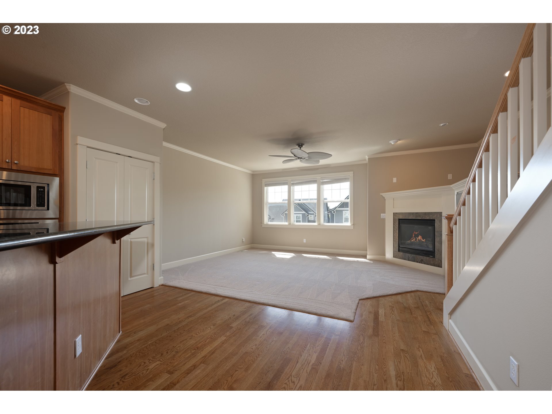 2213 St Moritz Loop West Linn, OR 97068 - Photo 15 of 48 a view of an empty room and a kitchen