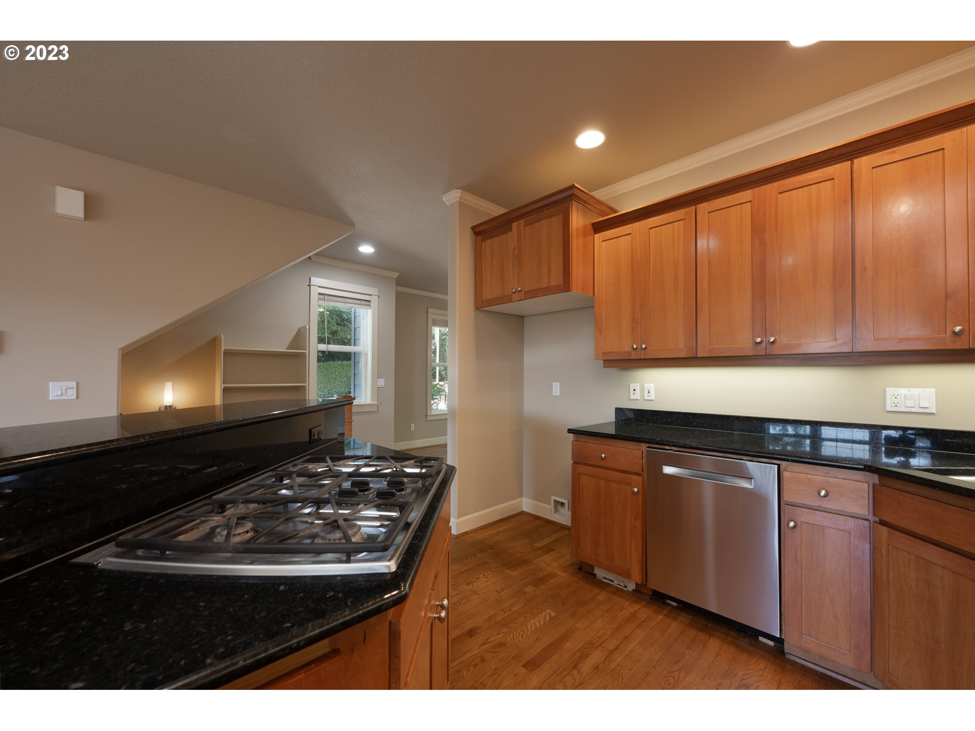 2213 St Moritz Loop West Linn, OR 97068 - Photo 20 of 48 a kitchen with kitchen island a sink stove and cabinets