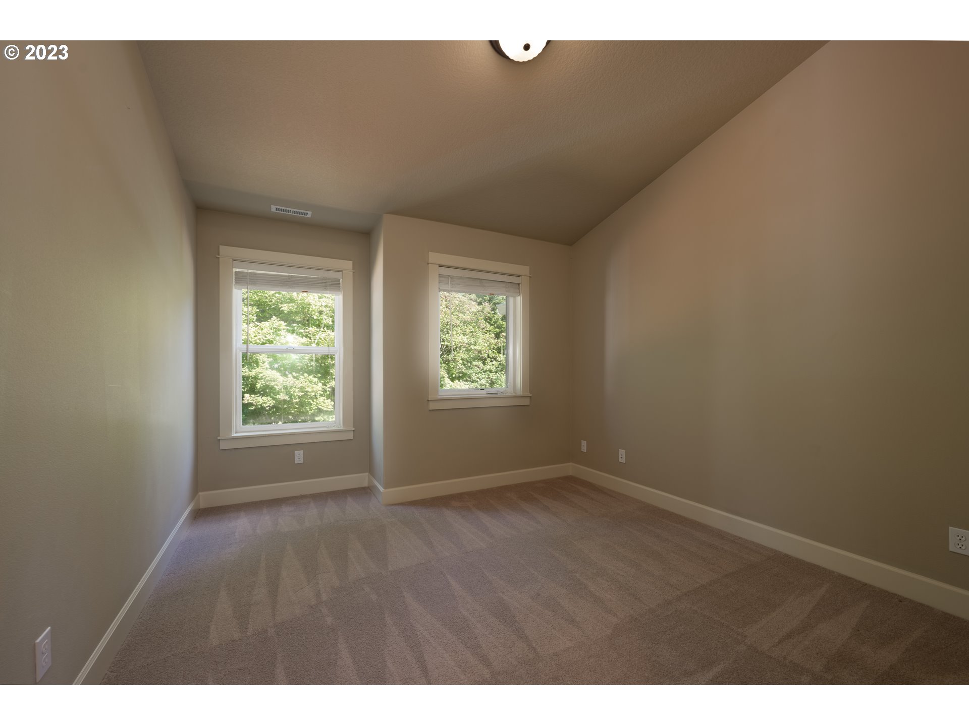 2213 St Moritz Loop West Linn, OR 97068 - Photo 30 of 48 a view of an empty room with a window