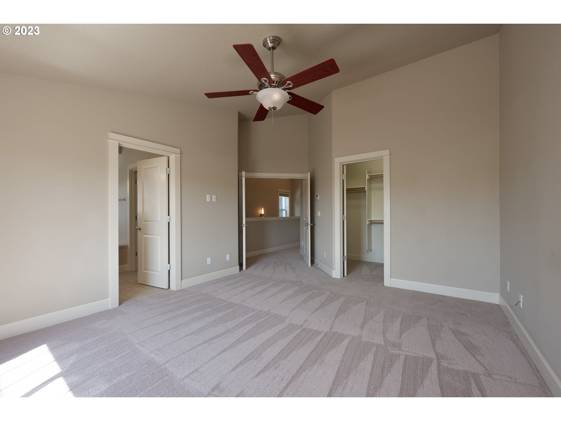 2213 St Moritz Loop West Linn, OR 97068 - Photo 36 of 48 a view of empty room with wooden floor
