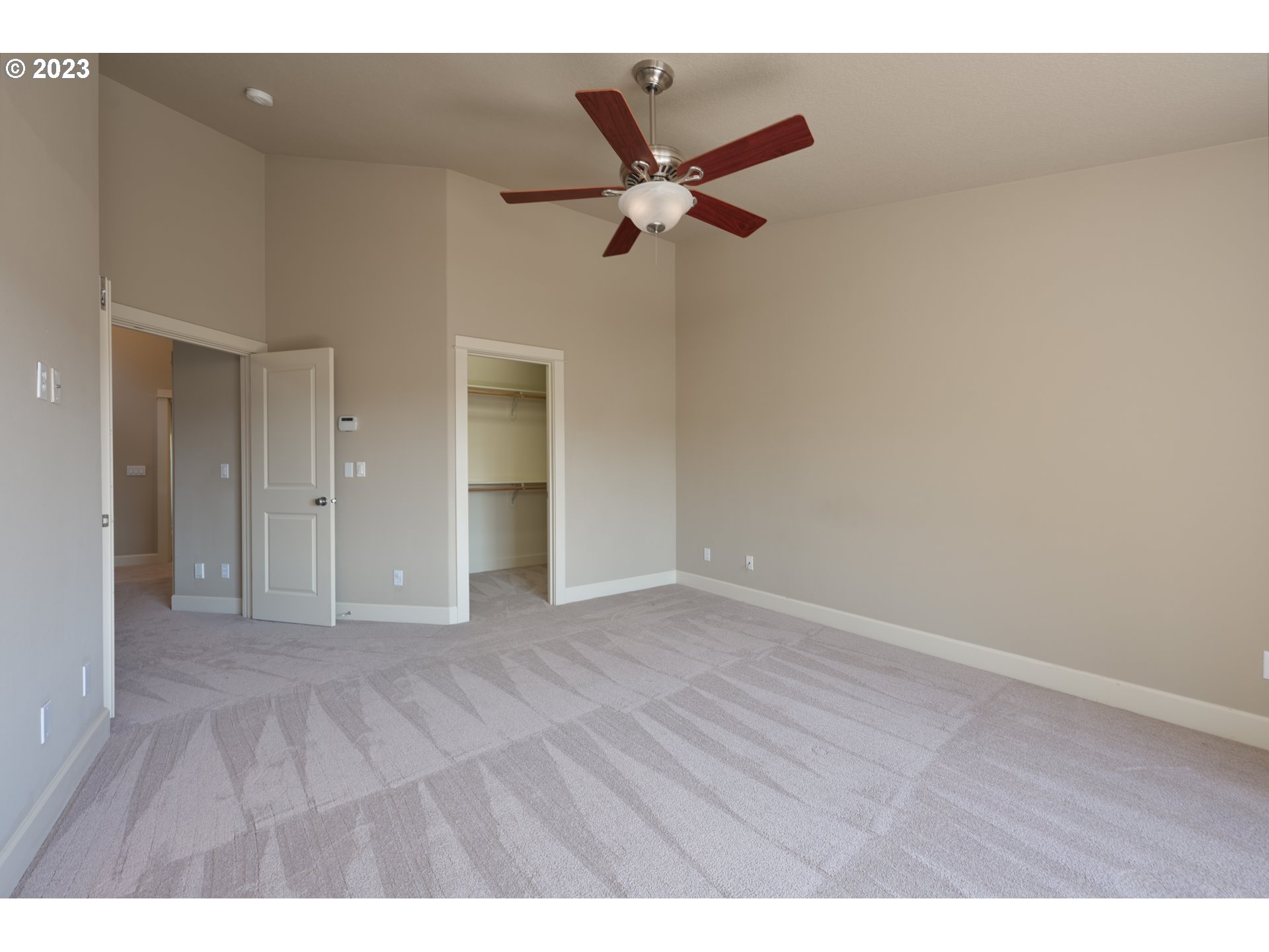 2213 St Moritz Loop West Linn, OR 97068 - Photo 37 of 48 a view of an empty room and wooden floor