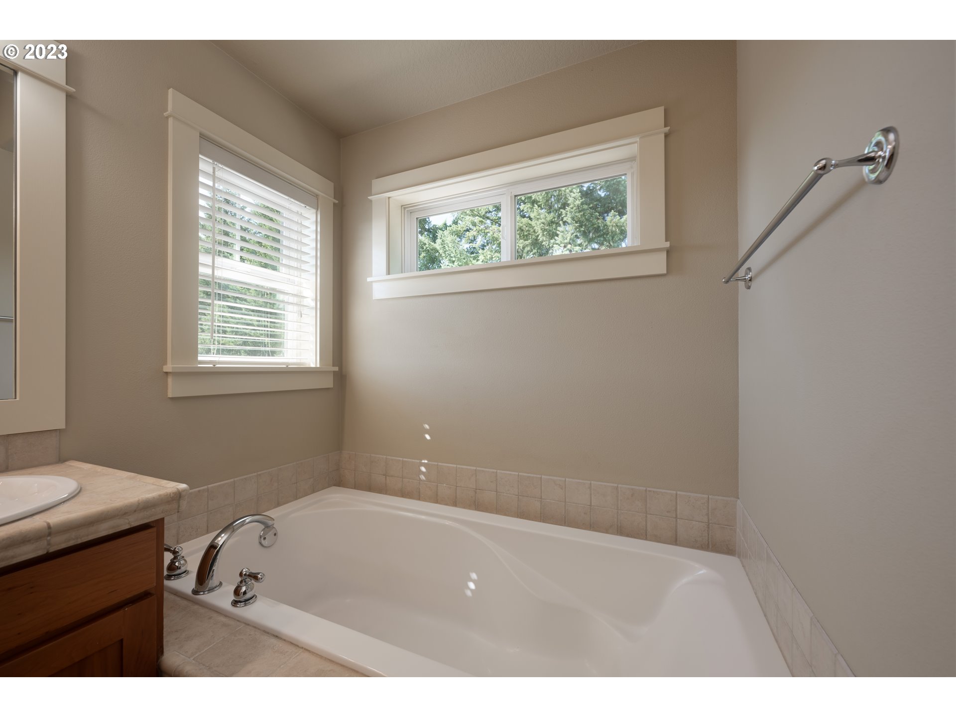 2213 St Moritz Loop West Linn, OR 97068 - Photo 39 of 48 a bathroom with a bathtub and a sink