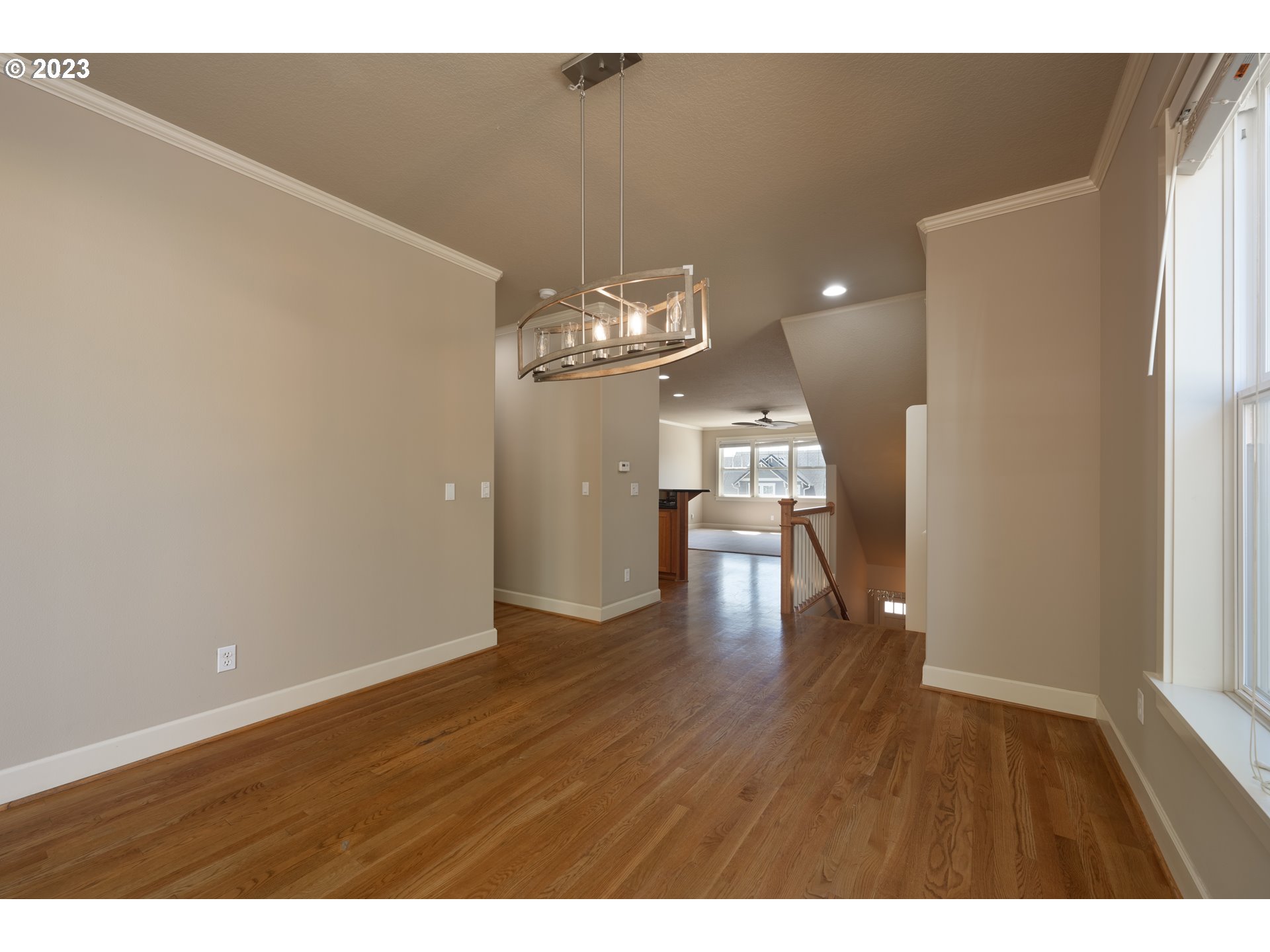 2213 St Moritz Loop West Linn, OR 97068 - Photo 10 of 48 a view of empty room with wooden floor