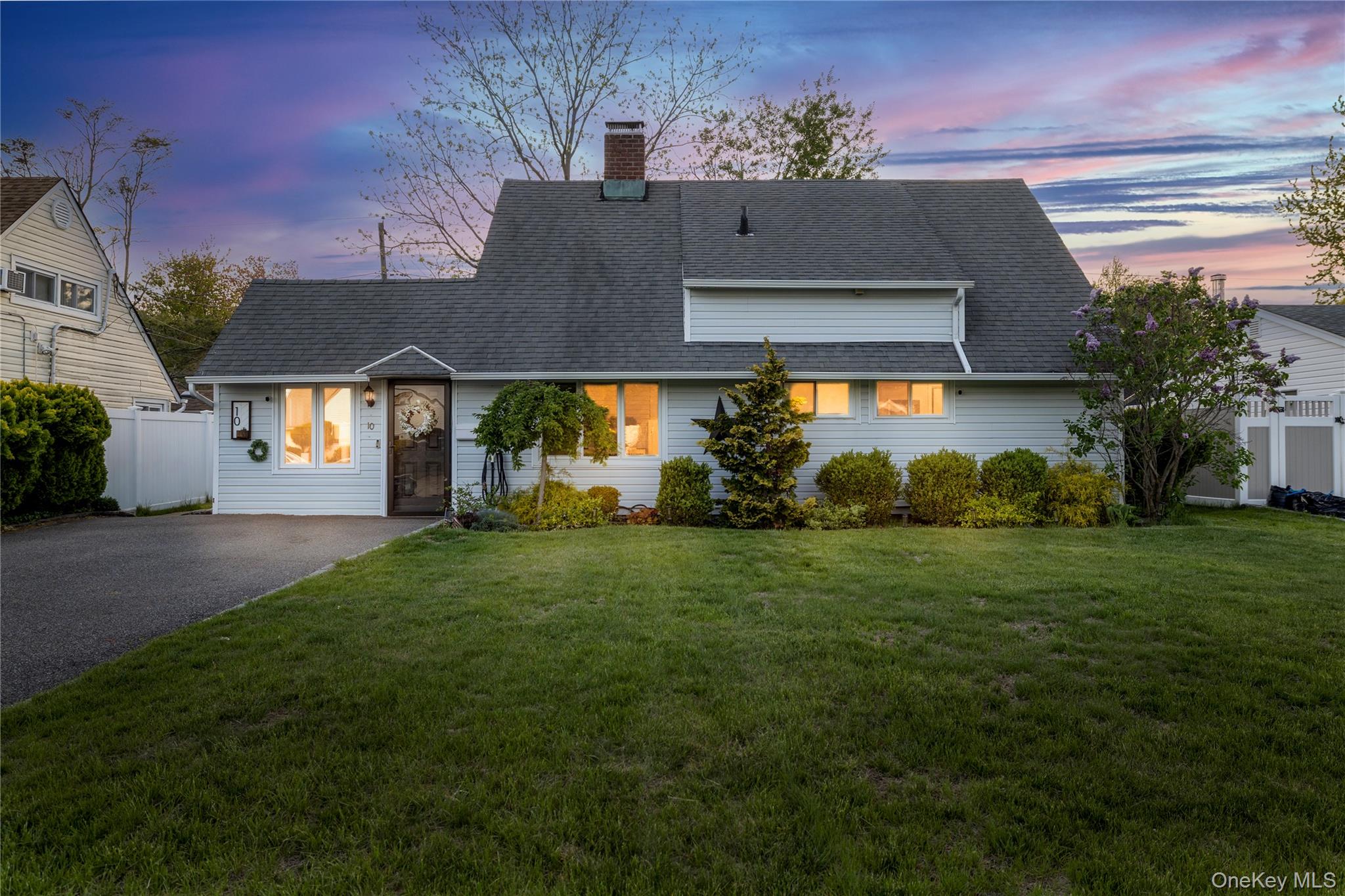 10 Rural Lane Levittown, NY 11756 - Photo 1 of 22 a view of a yard in front of a house
